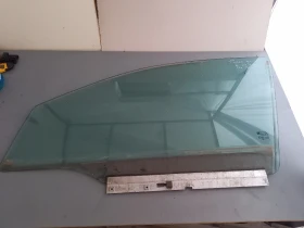 Стъкло предно ляво Опел Астра Н хечбек 