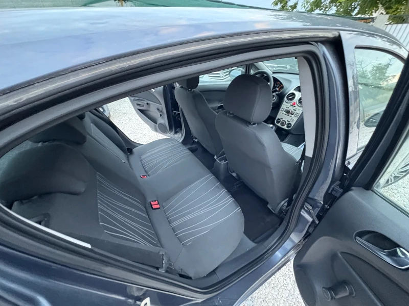 Opel Corsa 1.2 i 80 ps 2008 г, снимка 13 - Автомобили и джипове - 51396218