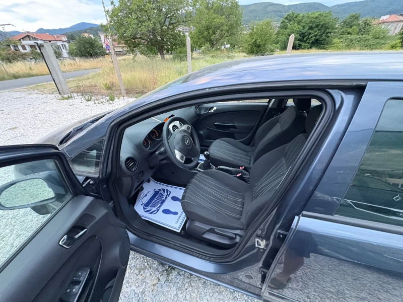 Opel Corsa 1.2 i 80 ps 2008 г, снимка 14 - Автомобили и джипове - 51396218