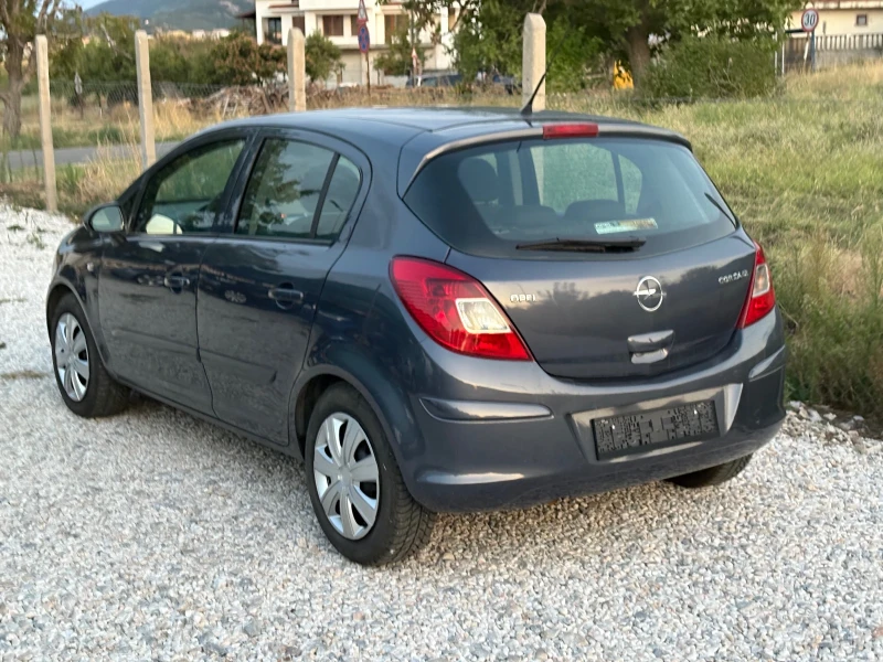 Opel Corsa 1.2 i 80 ps 2008 г, снимка 7 - Автомобили и джипове - 51396218