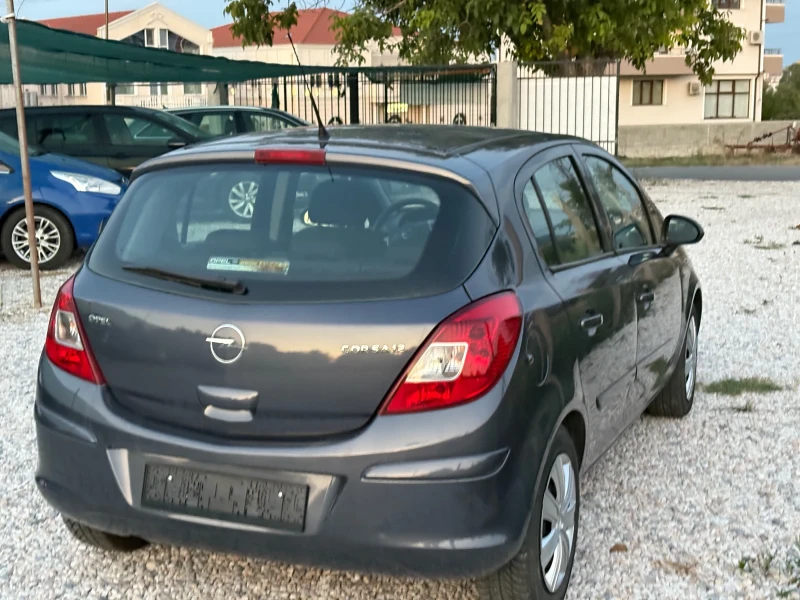 Opel Corsa 1.2 i 80 ps 2008 г, снимка 9 - Автомобили и джипове - 51396218