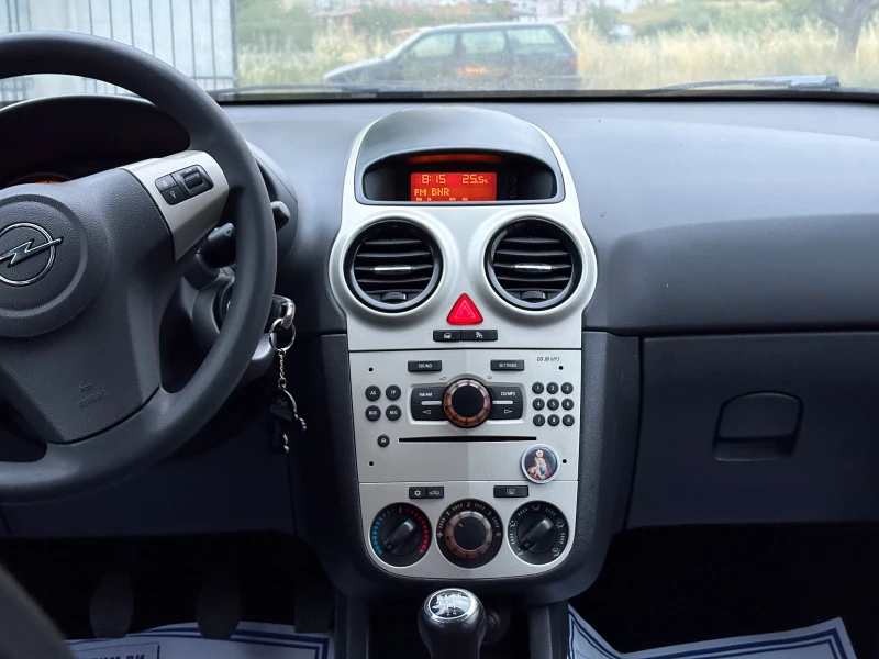 Opel Corsa 1.2 i 80 ps 2008 г, снимка 11 - Автомобили и джипове - 51396218