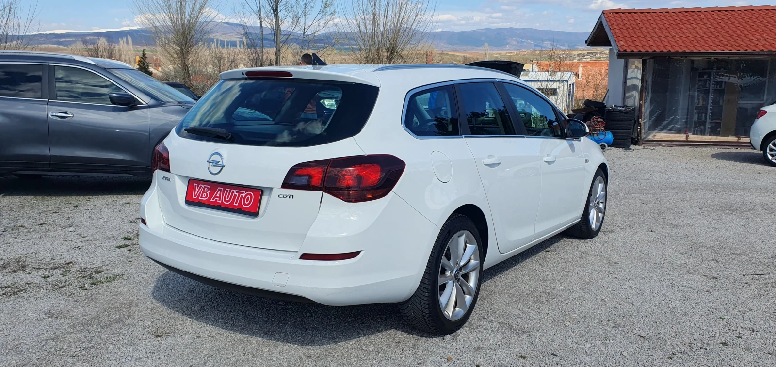 Opel Astra 1, 7CDTI COSMO - изображение 5