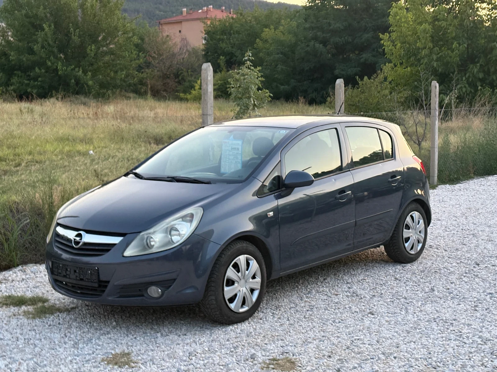 Opel Corsa 1.2 i 80 ps 2008 г - изображение 5