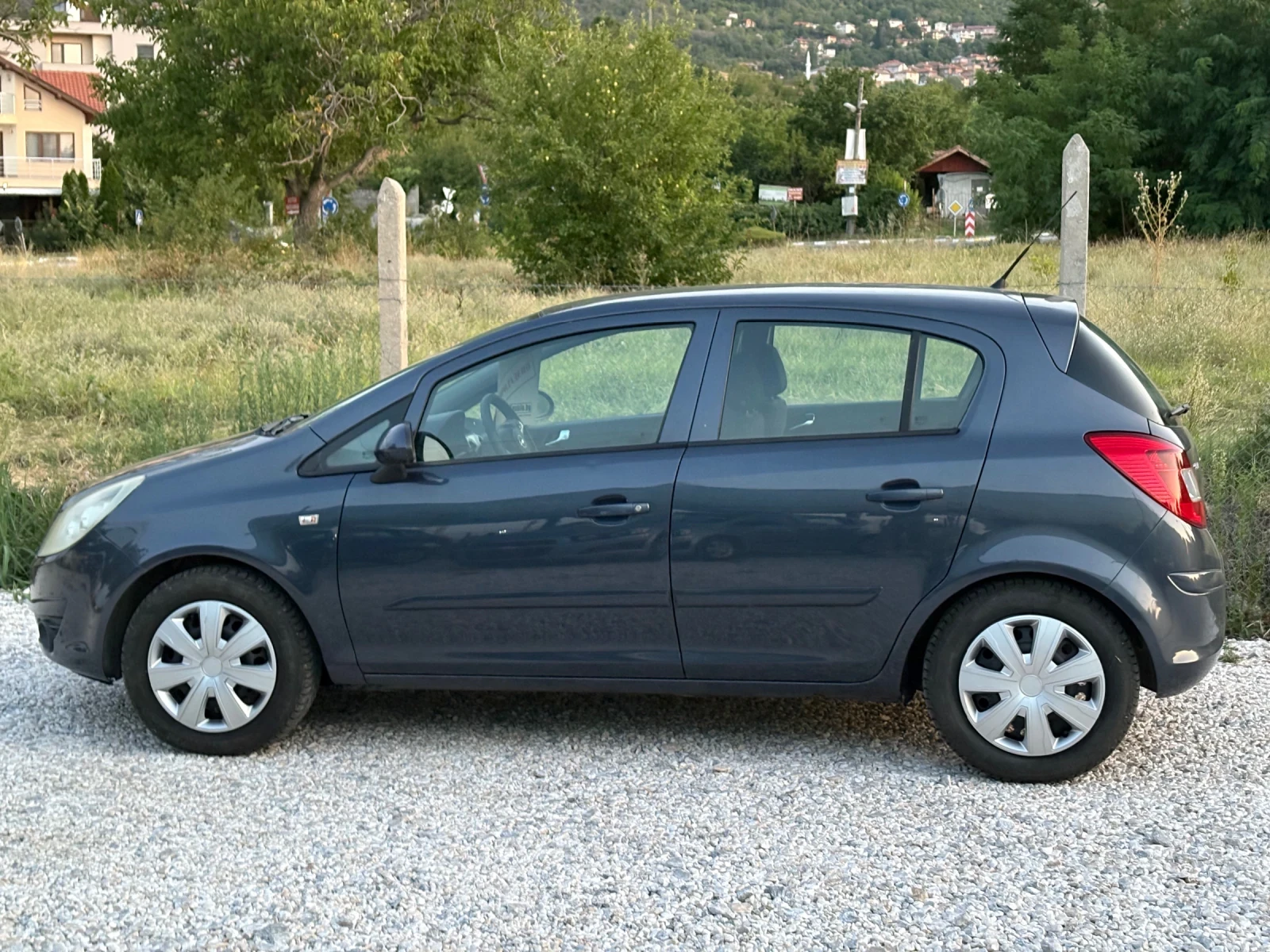 Opel Corsa 1.2 i 80 ps 2008 г - изображение 6