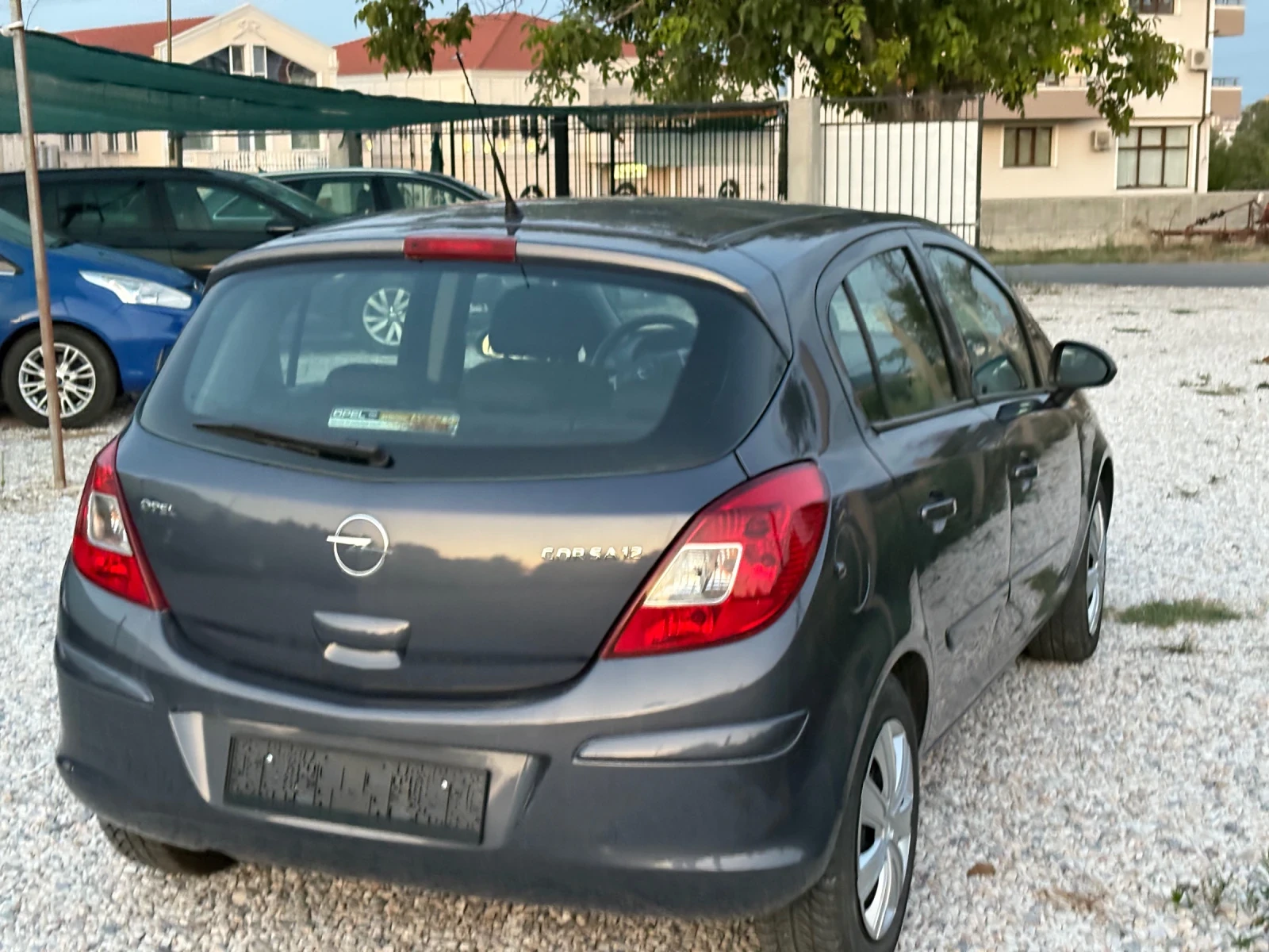 Opel Corsa 1.2 i 80 ps 2008 г - изображение 9