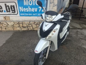     Honda Sh 125 ie   1 2010.