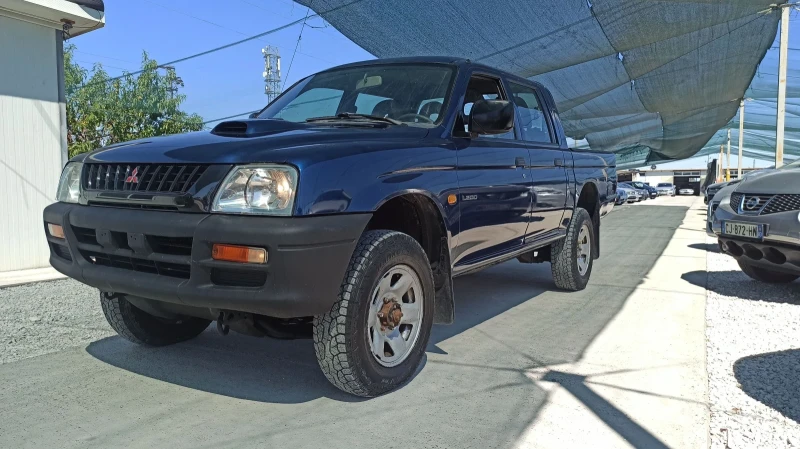 Mitsubishi L200 2, 5 4x4 БЪРЗИ//БАВНИ/ПЕРФЕКТЕН, снимка 2 - Автомобили и джипове - 47500446