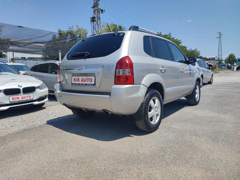 Hyundai Tucson 2.0CRDI-140ks-6sk-4X4, снимка 8 - Автомобили и джипове - 52095217