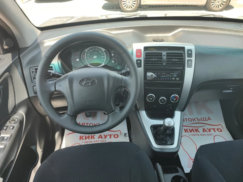Hyundai Tucson 2.0CRDI-140ks-6sk-4X4, снимка 11 - Автомобили и джипове - 52095217
