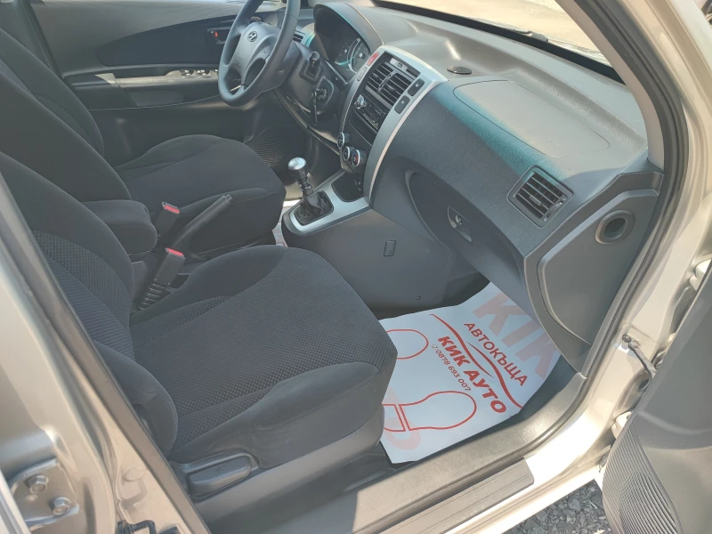 Hyundai Tucson 2.0CRDI-140ks-6sk-4X4, снимка 10 - Автомобили и джипове - 52095217