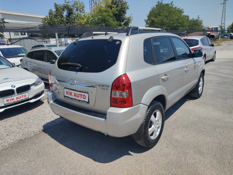 Hyundai Tucson 2.0CRDI-140ks-6sk-4X4, снимка 7 - Автомобили и джипове - 52095217