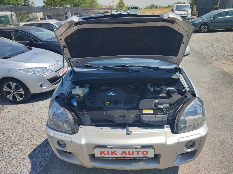 Hyundai Tucson 2.0CRDI-140ks-6sk-4X4, снимка 17 - Автомобили и джипове - 52095217