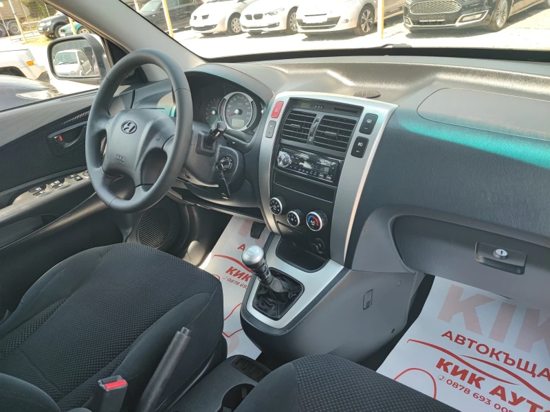 Hyundai Tucson 2.0CRDI-140ks-6sk-4X4, снимка 13 - Автомобили и джипове - 52095217