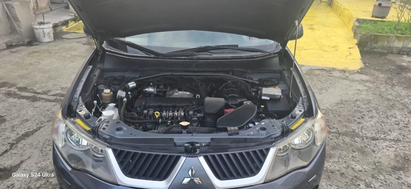 Mitsubishi Outlander 2.4 газ/бензин, снимка 8 - Автомобили и джипове - 52735600