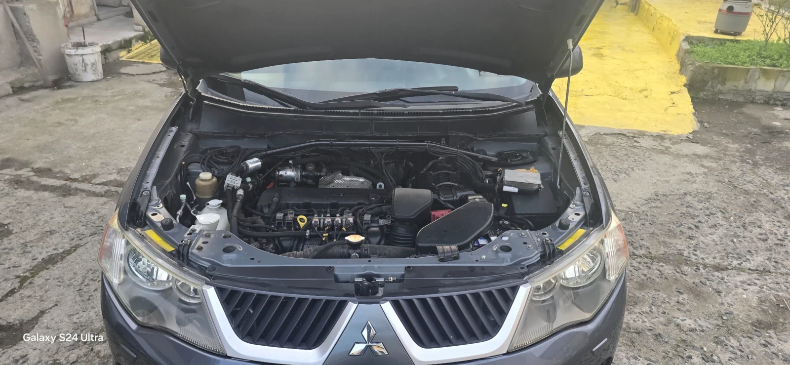 Mitsubishi Outlander 2.4 газ/бензин - изображение 8