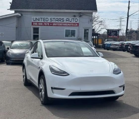 Tesla Model Y Standard Range, снимка 1