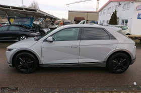 Hyundai Ioniq 5 UNIQ/325HP/4WD/PANO/360/MEMO/HUD/LED/CPLAY/719g - 35399 € / 69234.43 лв. - 91212818 2