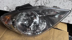       a Hyundai I20 - 01031099900010 / 92102-4P000