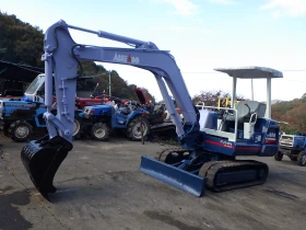 Багер Kubota KX-030