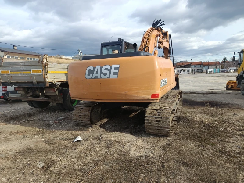 Багер Case СХ210В