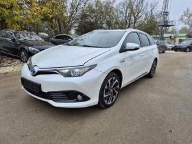 Toyota Auris 1.8 99к.с хибрид 