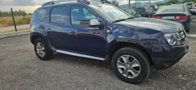 Dacia Duster 1.6i 4x4 SWISS - 14599 лв. - 36549556 7