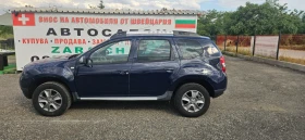 Dacia Duster 1.6i 4x4 SWISS - 14599 лв. - 36549556 3