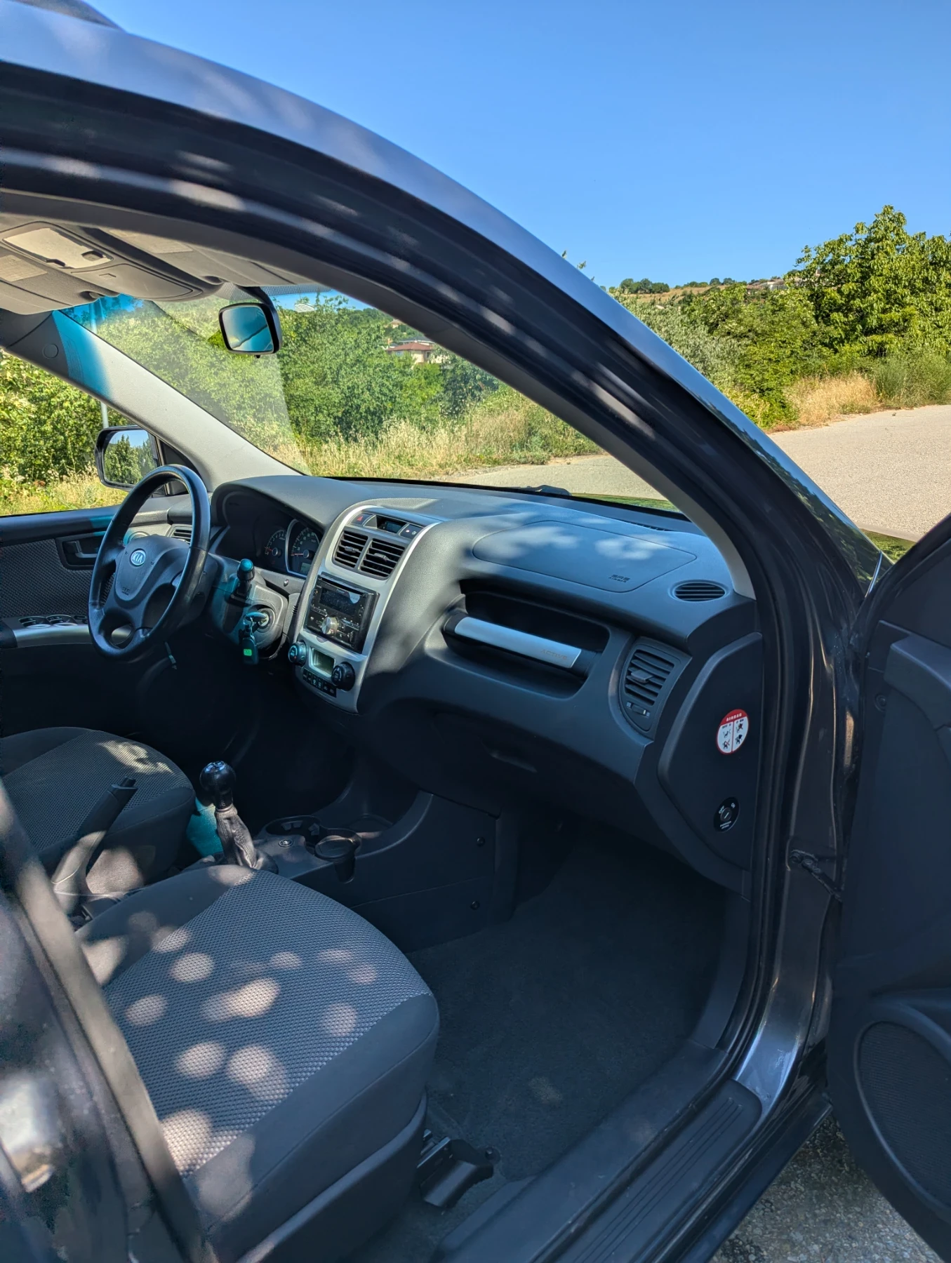 Kia Sportage 2.0 BIFUEL, снимка 13 - Автомобили и джипове - 55190257