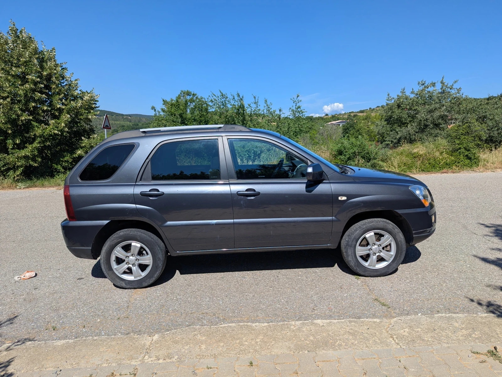 Kia Sportage 2.0 BIFUEL, снимка 4 - Автомобили и джипове - 55190257