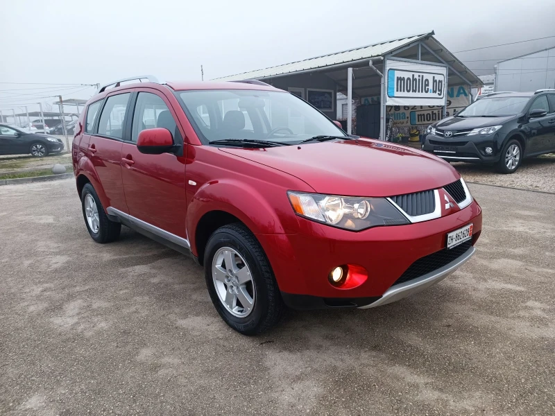 Mitsubishi Outlander 2.4i-170кс-ШВЕЙЦАРИЯ-РЪЧКА-4Х4, снимка 2 - Автомобили и джипове - 52815854