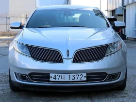 ������ Lincoln MKS