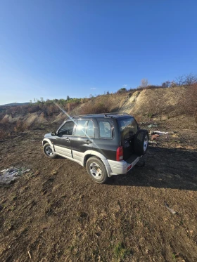     Suzuki Grand vitara 2.0  87.