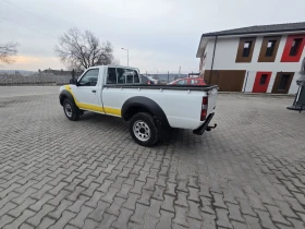 Nissan Navara 2.5 ТД 133 кс 2012г - 8800 € / 17211.30 лв. - 84542339 4