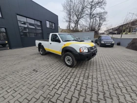 Nissan Navara 2.5 ТД 133 кс 2012г - 8800 € / 17211.30 лв. - 84542339 2