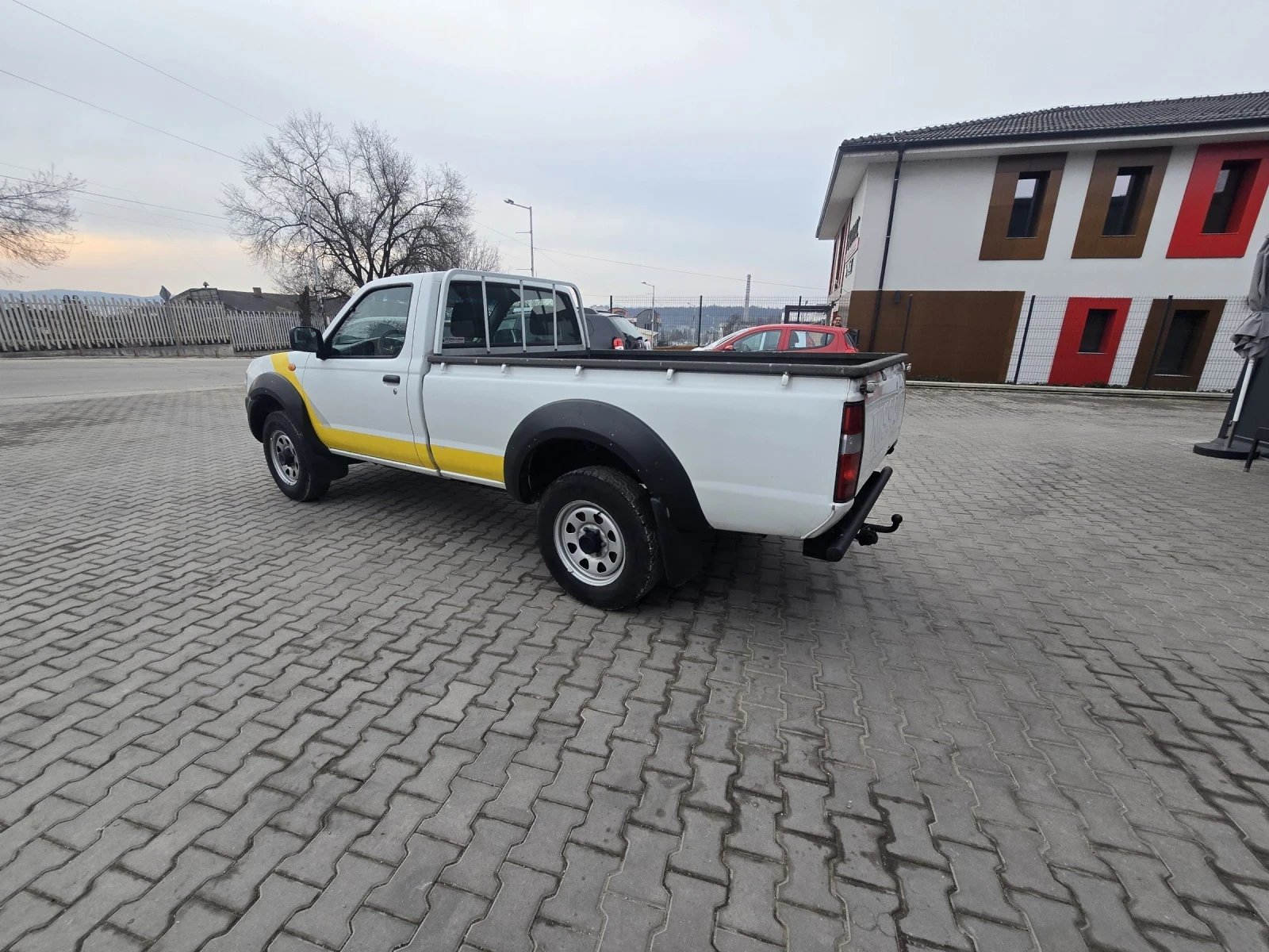 Nissan Navara 2.5 ТД 133 кс 2012г, снимка 4 - Автомобили и джипове - 53717341