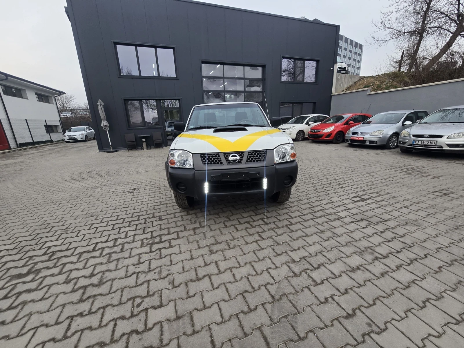 Nissan Navara 2.5 ТД 133 кс 2012г, снимка 3 - Автомобили и джипове - 53717341