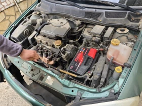 Opel Astra 1.6-75 коня-газ/бензин, снимка 13