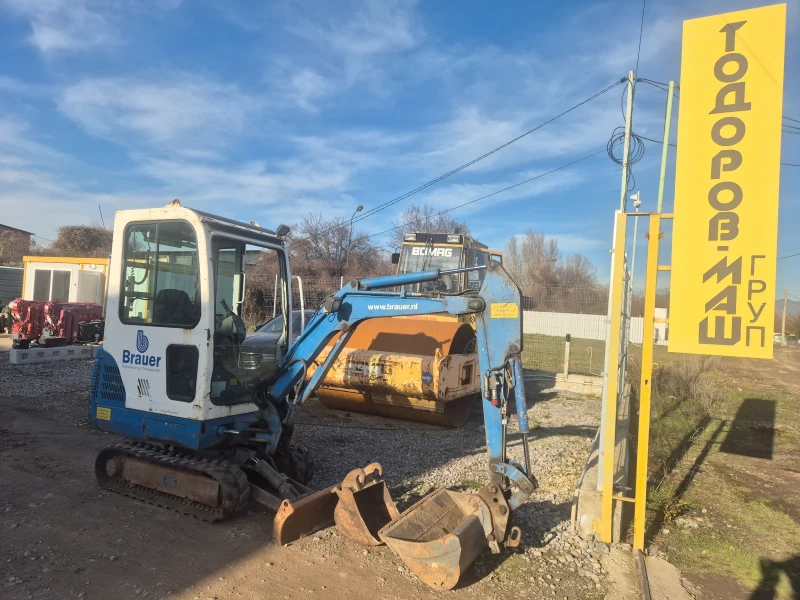 Багер Takeuchi TB016