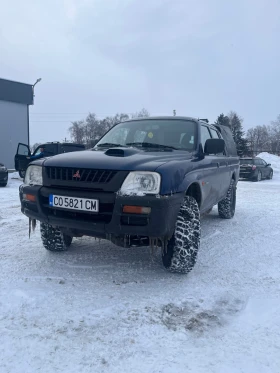 Mitsubishi L200, снимка 1