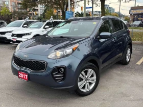 ������ Kia Sportage