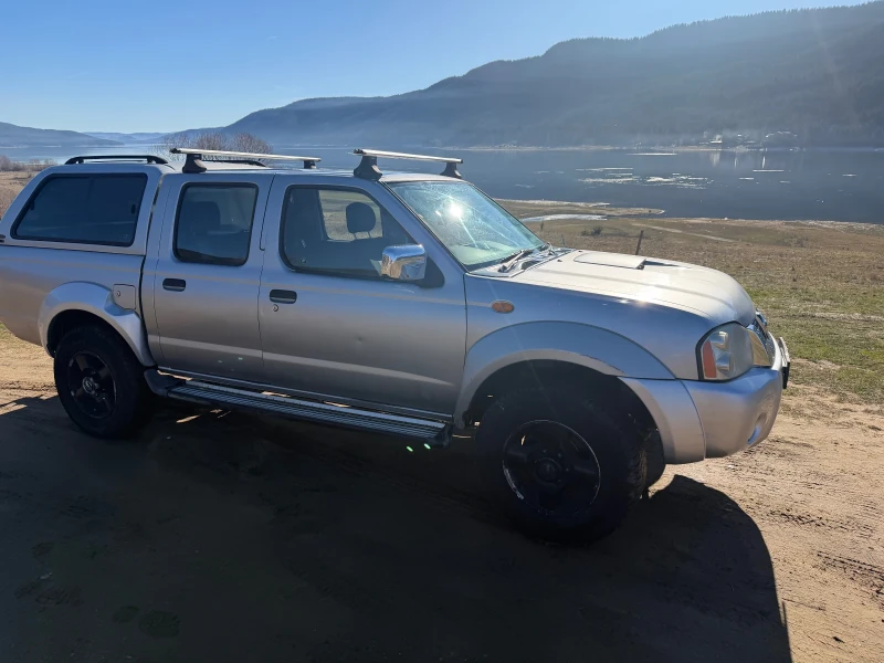 Nissan Navara 2.5 d / 133 k.c., снимка 2 - Автомобили и джипове - 52812614