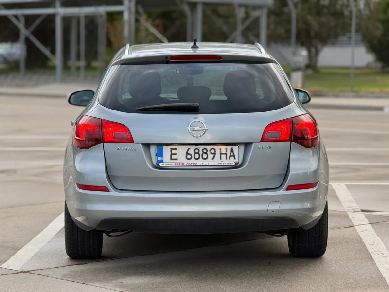 Opel Astra J Sport tourer , снимка 4 - Автомобили и джипове - 51848031