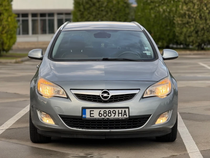 Opel Astra J Sport tourer , снимка 2 - Автомобили и джипове - 51848031
