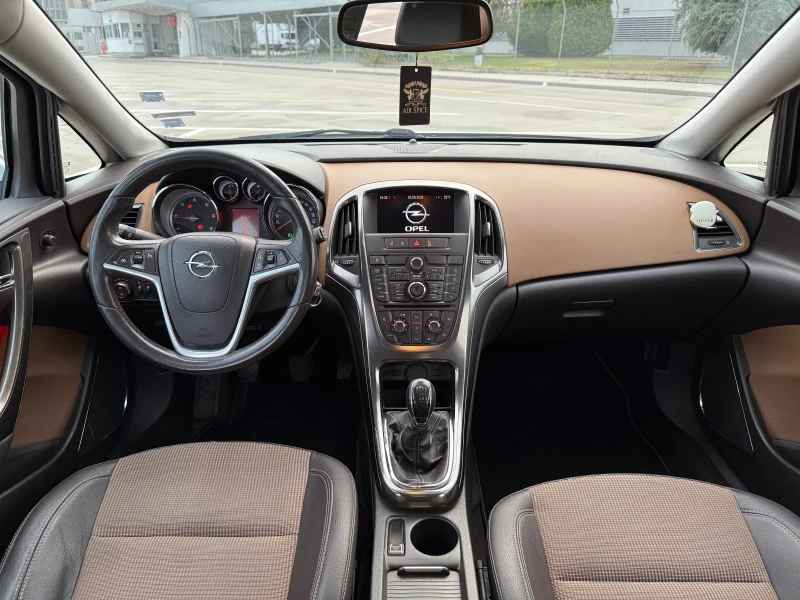 Opel Astra J Sport tourer , снимка 9 - Автомобили и джипове - 51848031