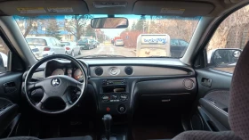 Mitsubishi Outlander 2.4i Газ, снимка 12