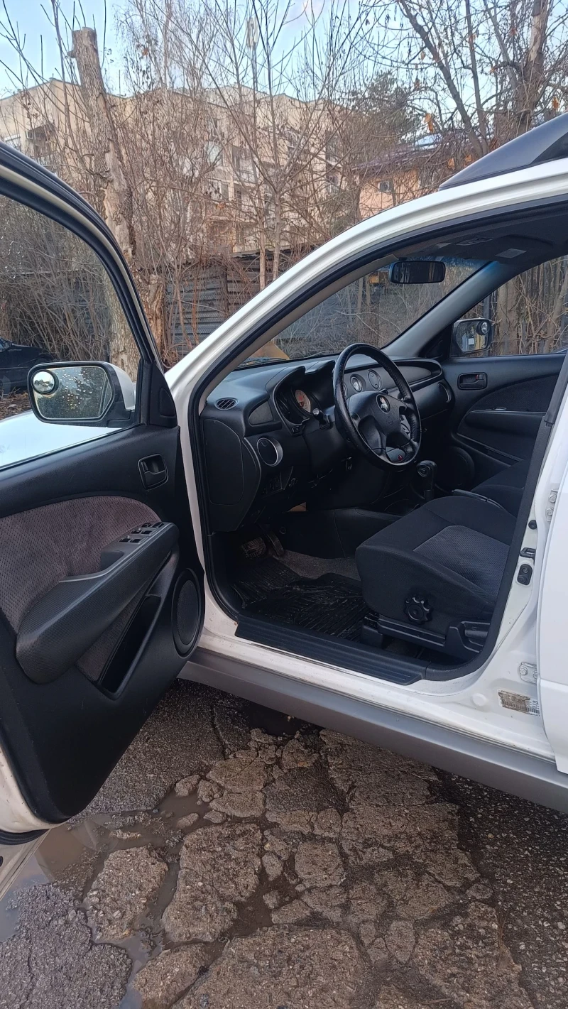 Mitsubishi Outlander 2.4i Газ, снимка 7 - Автомобили и джипове - 48434261