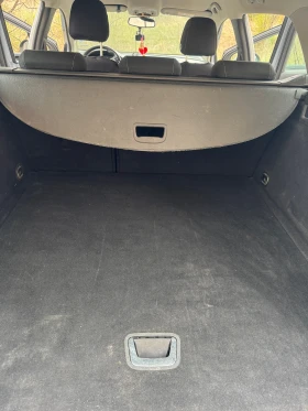 Opel Astra спорт тоурер, снимка 13