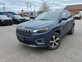 ������ Jeep Cherokee
