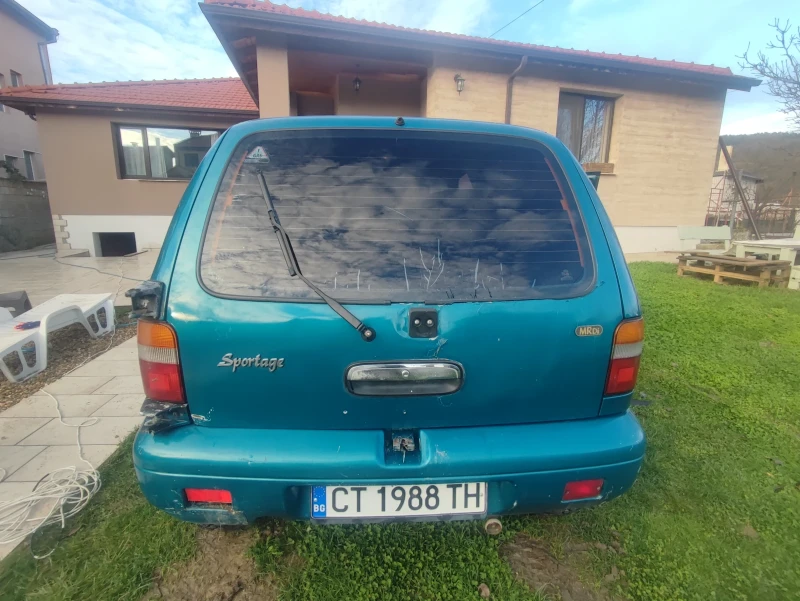Kia Sportage 2.0, снимка 6 - Автомобили и джипове - 52616386